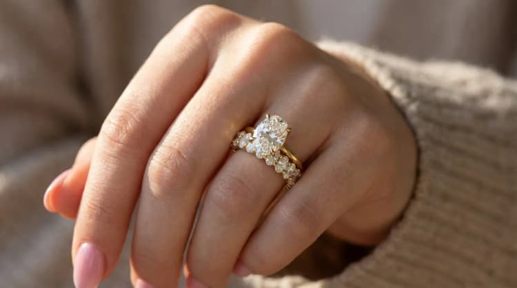 Oval solitaire engagement ring and eternity band stack by Lily Dia Jewellery