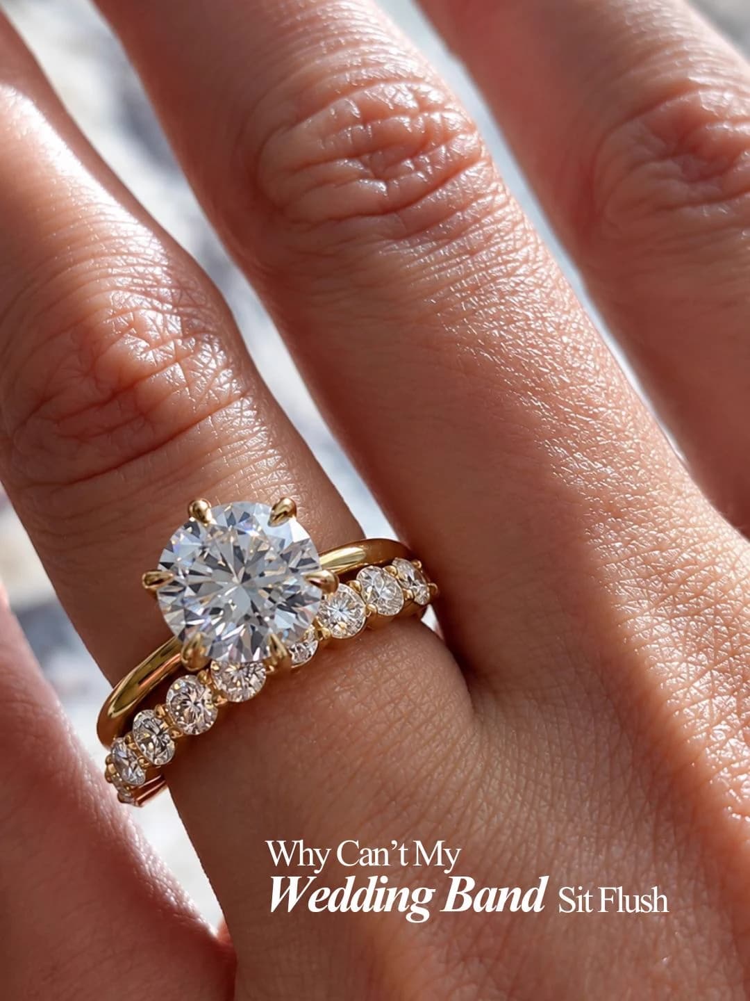 Round diamond solitaire engagement ring with a diamond wedding band in yellow gold, captioned why can't my wedding band sit flush, by Lily Dia Jewellery