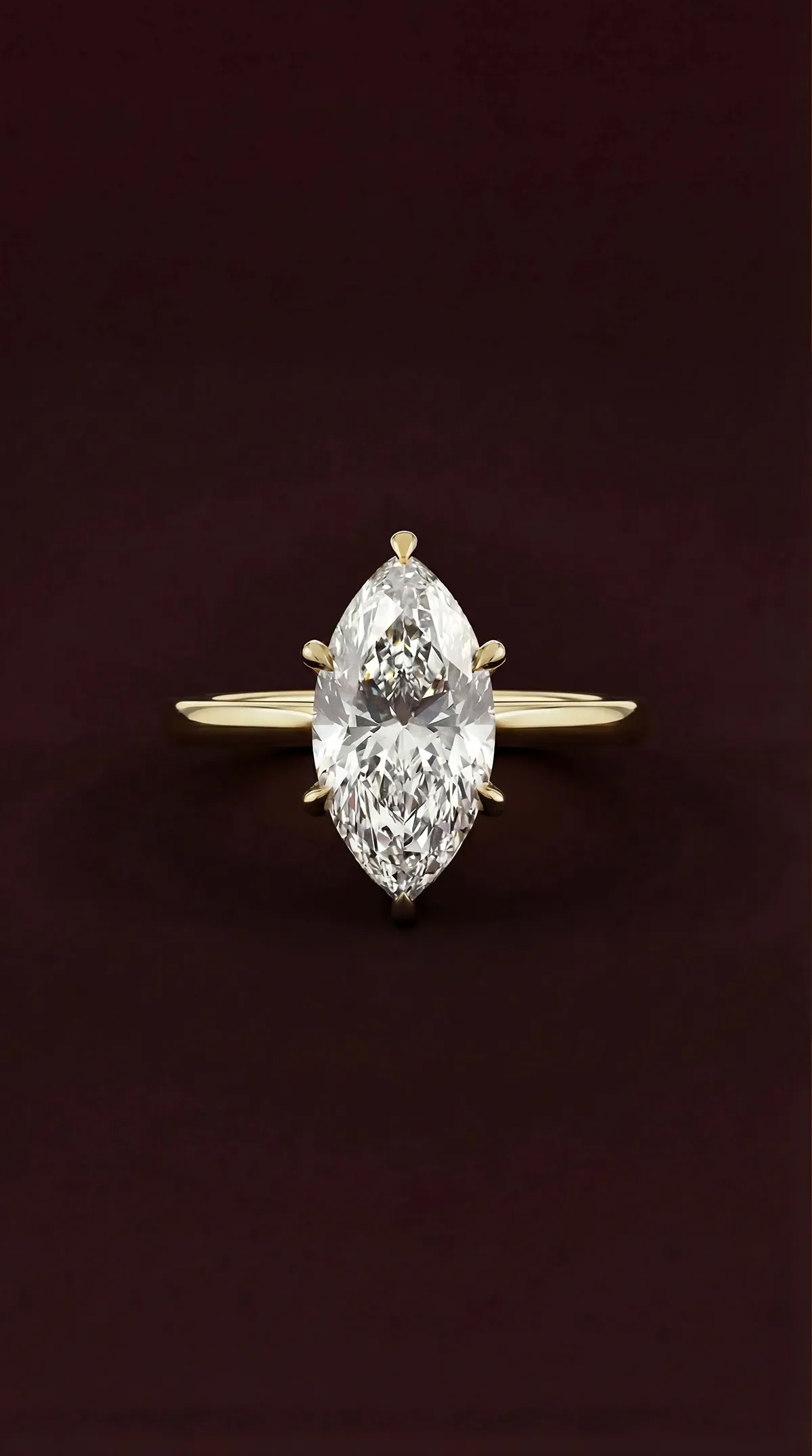 Marquise lab-grown diamond solitaire engagement ring with six claws in yellow gold, by Lily Dia Jewellery