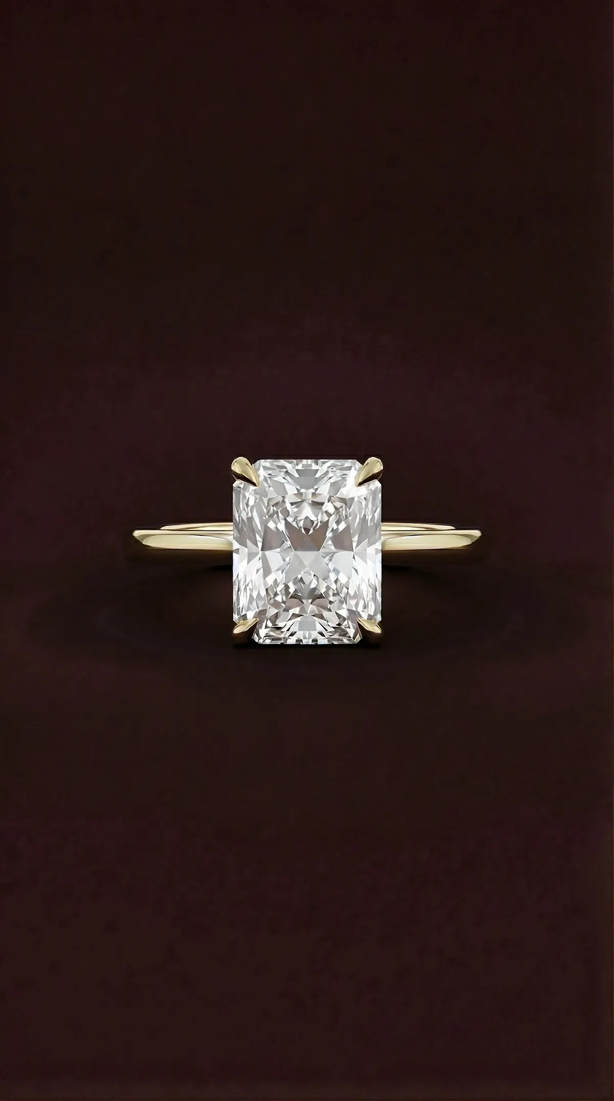 Radiant cut lab-grown diamond solitaire engagement ring with four claws in yellow gold, by Lily Dia Jewellery